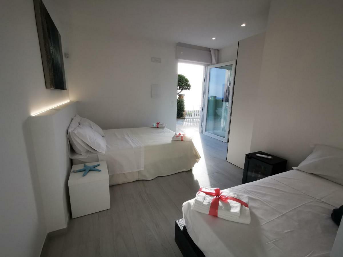 Sunset Bay Torre Suda